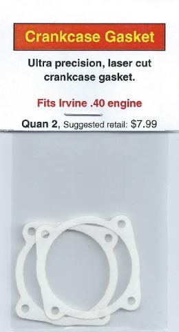 A white gasket is attached to the side of an engine.