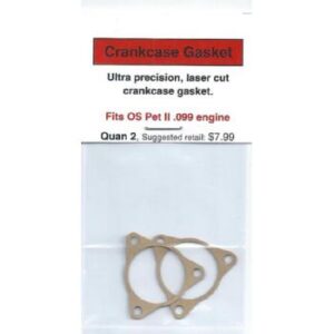 A pair of copper gaskets for an engine.