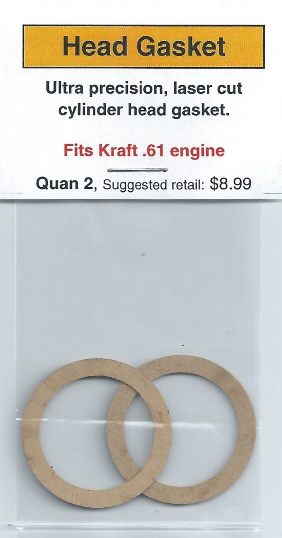 A pair of paper gaskets for the engine.