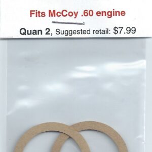 A pair of paper gaskets for mccoy engine.