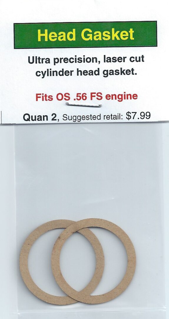 A pair of paper gaskets for an engine.
