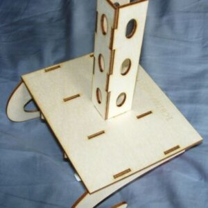 A wooden tower with holes for the top.