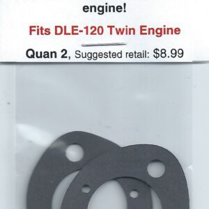 A pair of carburetor gaskets for a twin engine.