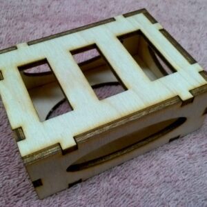 A wooden box with three compartments on it.